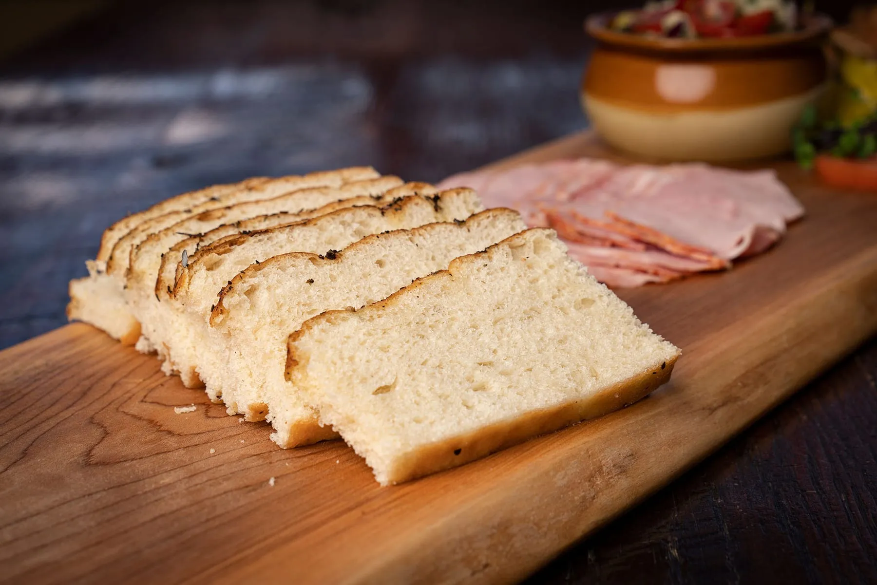 Meats and bread on a board